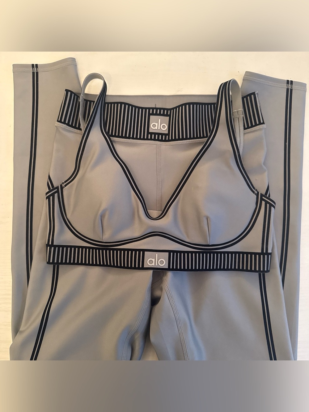 ALO Yoga Light Gray Strappy Sports Bra with Black Trim